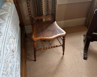Small antique cane chair.  15" w x 12.5"w x 27.5"h.  seat height 14".  For sale during in-person shopping Friday and Saturday.