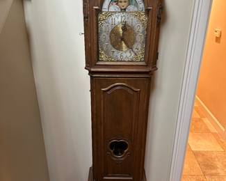 $300  Uhrenfabrik Mũhlheim, Mũller & Co. Grandfather clock with works made by Harmonie Vollgong.  Circa 19th century.  21"w x 12"d x 88"h. For sale during in-person shopping Friday and Saturday only.