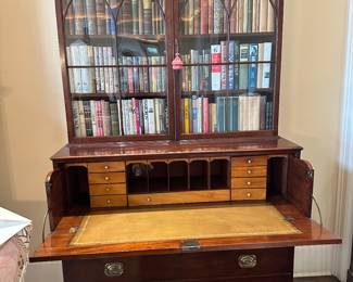 Photo with the drop leaf open showing the leather inlay surface and drawers etc. NOT ALL BOOKS IN THIS PHOTO ARE AVAILABLE.  