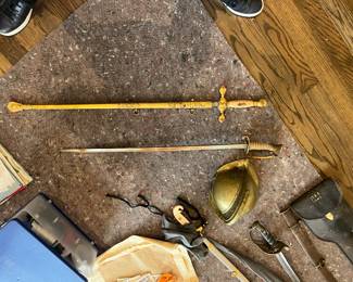 swords and helmet for sale during in-person shopping Friday and Saturday.