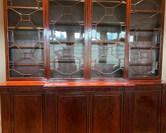 $9,000.  Stunning English Hepplewhite mahogany breakfront library bookcase.  Separates for moving.  105" w x 25" x 108"h.  Originally $16,000.  