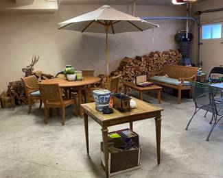 Teak furniture, a cord plus of seasoned firewood. vintage game table, vintager wrought iron outdoor set and more.