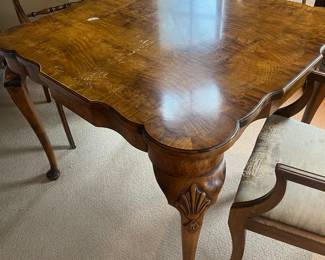$330. Antique game table with carved detailing.  38"sq. by 30"h.  As found issue on surface. Available for online purchase which opens Wednesday at 7pm.  See sale description to learn how to buy online. 