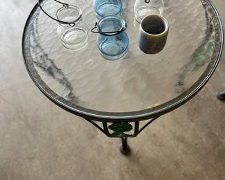 occasional table sold with two armchairs.