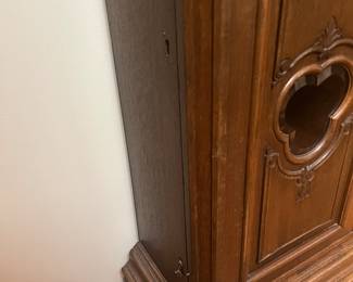 Side view of lower half of the grandfather clock