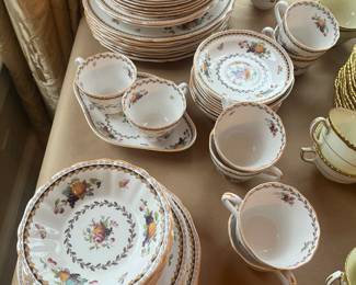 $200. Spode "Rockingham" china set consisting of 8 dinner plates, 6 soup bowls, 2 large cream soups, 7 fruit bowls, 8 salad plates. 8 bread/butter plates, 10 cups and saucers and 1 serving platter.  