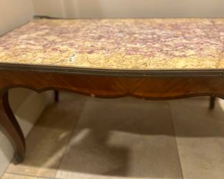 Marble and wood table with as found issue on back corner.  For sale during in-person shopping Friday and Saturday.