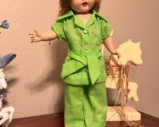 Vintage doll with stand