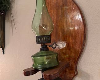 Unique wall holder with green oil lanp