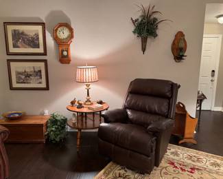 Brown leather recliner in perfect condition 