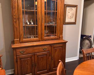 China cabinet.  Glass serving pieces inside 