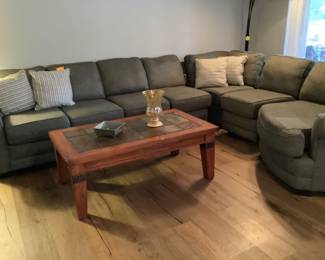 Sectional has sold table and lamp available