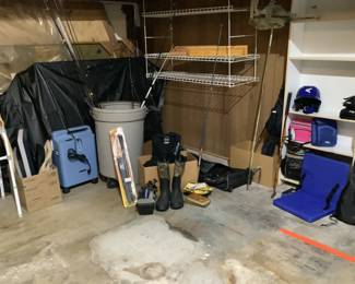 some fishing items also hanging storage shelves