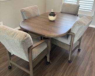 Purchased from Kent furniture (with receipt of 2084.00) comes this gorgeous and rarely used Chromcraft Nevada Dune-Smoke Table & 4 chairs. 