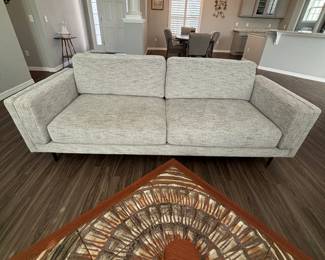 Beautiful brand new couch we don’t believe was ever sat on!