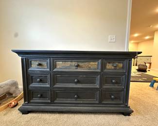 C13 - $150. "Soho Baby" Stone Hill 9 drawer Dresser Smoke Gray - 2017.  Dresser measures 60" wide x 20" deep x 34" tall. One knob needs some glue - all drawers slide easily with soft close drawers. Top has some flaking paint - see photos.  