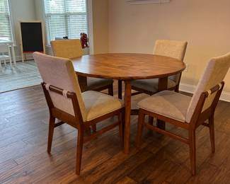 C35 - $375. Dining Table with 4 Chairs. Measures 47.5" round x 30.5" tall. Manufactured 2023.  Excellent Condition. (Surrey Ellis Brown Rooms to Go - Still for sale!)