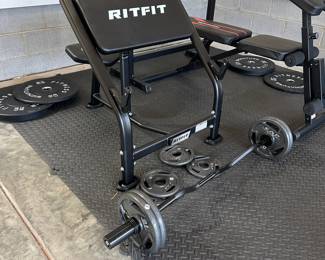 C96 - $185. Ritfit Preacher Curl Bench with bar and weights.  
