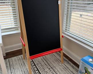 C66 - $30. IKEA Double sided Easel. Measures 24.5" wide x 19" deep x 44.5" tall. 