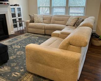 C63 - $1450. Rooms to Go 6 Piece Dual Power Reclining Sectional. Gently used in very good condition. Everything works as it should! Power adjustable head and foot rests. Has USB charging port - hideaway cup holders and a reading light! Assembled it is 147.5" x 132.5" x 36" tall. Oversized and super comfy!