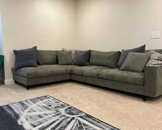 C22 - $1750. Goossens Furniture Sectional Sofa. Thick Leather Feels very durable! Moves in 2 parts. Assembled it measures 10" long x 7". (Moves in 7' parts) 39" deep x 34" tall. Floor to seat is 17".  Very firm & comfy! (Brand from the Netherlands that they brought back less than a year ago.)