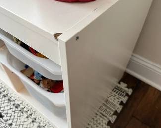 C67 - $60. IKEA. Measures 39" wide x 17" deep x 22.25" tall. With storage bins. A few marks in the wood but sturdy and lots of life left!