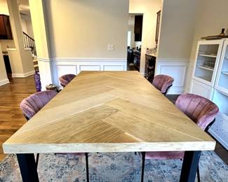 C48 - $350. Herringbone Wooden Look Top with Metal Base. Table Measures 79" long x 39" x 30" tall. Chairs are priced separately. 
