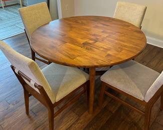 C35 - $375. Dining Table with 4 Chairs. Measures 47.5" round x 30.5" tall. Manufactured 2023.  Excellent Condition. (Surrey Ellis Brown Rooms to Go - Still for sale!)