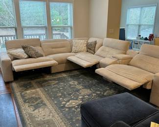 C63 - $1450. Rooms to Go 6 Piece Dual Power Reclining Sectional. Gently used in very good condition. Everything works as it should! Power adjustable head and foot rests. Has USB charging port - hideaway cup holders and a reading light! Assembled it is 147.5" x 132.5" x 36" tall. Oversized and super comfy!
