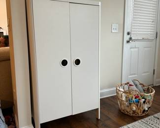 C64 - $100. IKEA Busunge Wardrobe - White. Was used for kids dress up - one door needs tightened. 