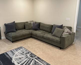 C22 - $1750. Goossens Furniture Sectional Sofa. Thick Leather Feels very durable! Moves in 2 parts. Assembled it measures 10" long x 7". (Moves in 7' parts) 39" deep x 34" tall. Floor to seat is 17".  Very firm & comfy! (Brand from the Netherlands that they brought back less than a year ago.)