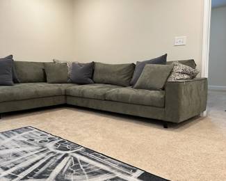 C22 - $1750. Goossens Furniture Sectional Sofa. Thick Leather Feels very durable! Moves in 2 parts. Assembled it measures 10" long x 7". (Moves in 7' parts) 39" deep x 34" tall. Floor to seat is 17".  Very firm & comfy! (Brand from the Netherlands that they brought back less than a year ago.)