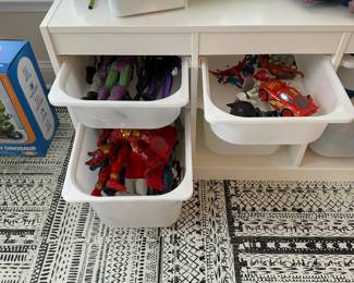 C67 - $60. IKEA. Measures 39" wide x 17" deep x 22.25" tall. With storage bins. A few marks in the wood but sturdy and lots of life left!