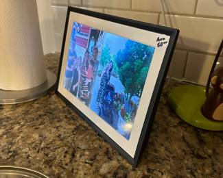 C91 - $50. Aura Digital Photo Frame. 