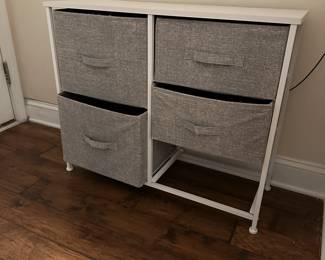 C79 - $20. IKEA Storage. Measures 33.5" x 11.75" deep x 27.5" tall. Missing one basket. Was used for hats/gloves etc. 