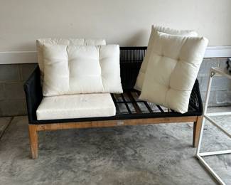 C92 - $80. Safavieh Patio Bench. Measures 54" x 26.5" deep x 30.5" tall. Missing 1 Bottom Cushion. 