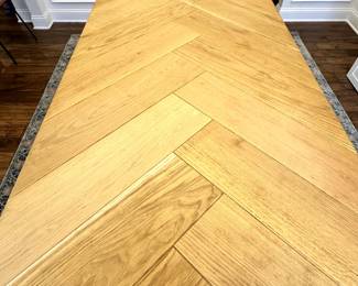 C48 - $350. Herringbone Wooden Look Top with Metal Base. Table Measures 79" long x 39" x 30" tall. Chairs are priced separately. 