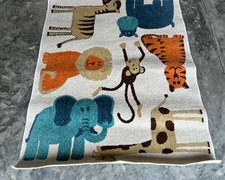 C102 - $30. Kids Jungle Rug 3' x 5'. 