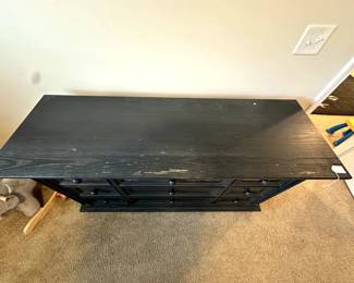 C13 - $150. "Soho Baby" Stone Hill 9 drawer Dresser Smoke Gray - 2017.  Dresser measures 60" wide x 20" deep x 34" tall. One knob needs some glue - all drawers slide easily with soft close drawers. Top has some flaking paint - see photos.  