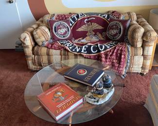 Man cave sofa with a unique glass/lantern table 