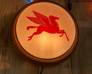 Pegasus sign with wood frame.