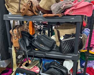 purses will be 98% 2 dollars a piece one-time event we have too much and this was not donated. Estate Sale good merchandise only no smell no stains some with new tags. 