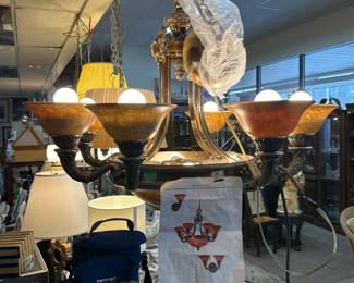 take a close look at this lamp. Need a big room. new but has been sitting for years and has some patina. Looks awesome! its 1,000