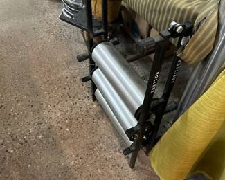 motorcycle thing giving you the ability to run it in the garage with wheels turning