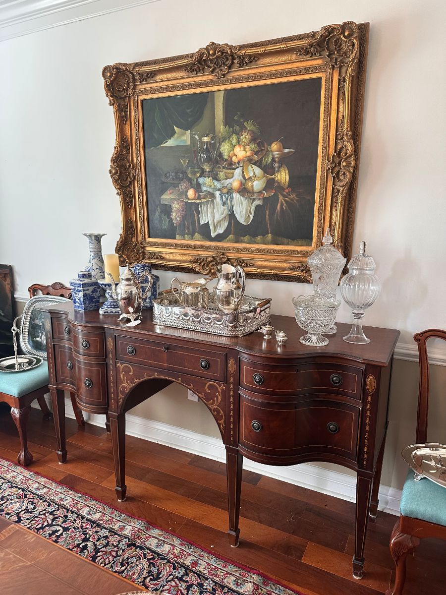 Buffet with silver plate tray