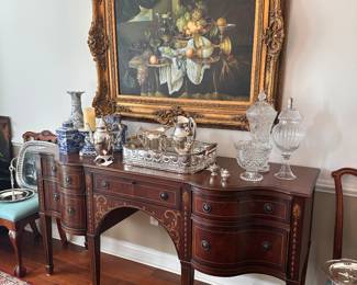 Buffet with silver plate tray
