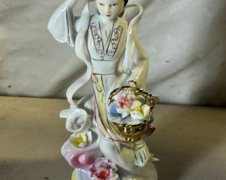 Porcelain geisha girl