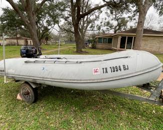 CARIBE INFLATABLE BOAT 18HP TOHATSU OUTBOARD MOTOR-WITH TRAILER