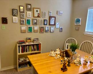 Lots of frames, books and Christmas items.