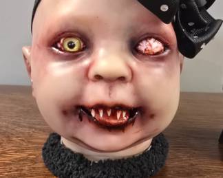 Dollies in the Attic creepy ass head